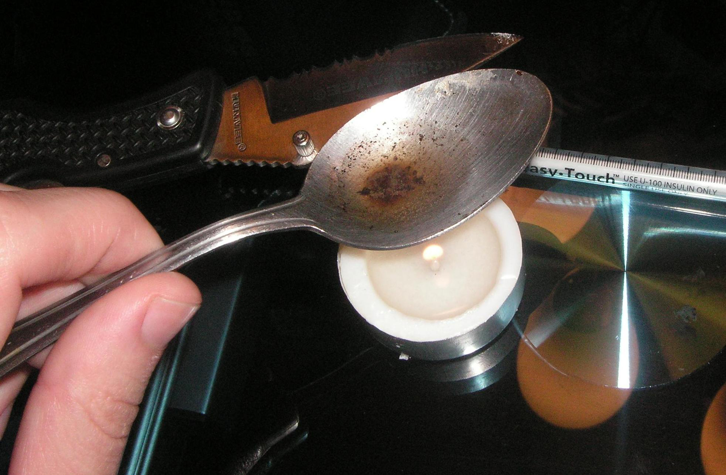 cooking black tar heroin for iv injection